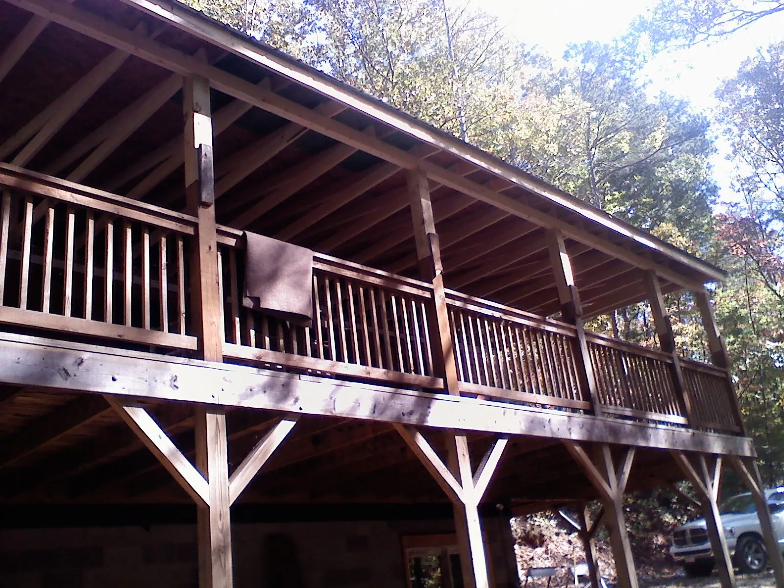 Timber framing under a new elevated porch and deck — Roof Leak Repair in Byars by Roofing Brothers
